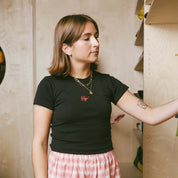MAILE WEARING CRY BABY TEE